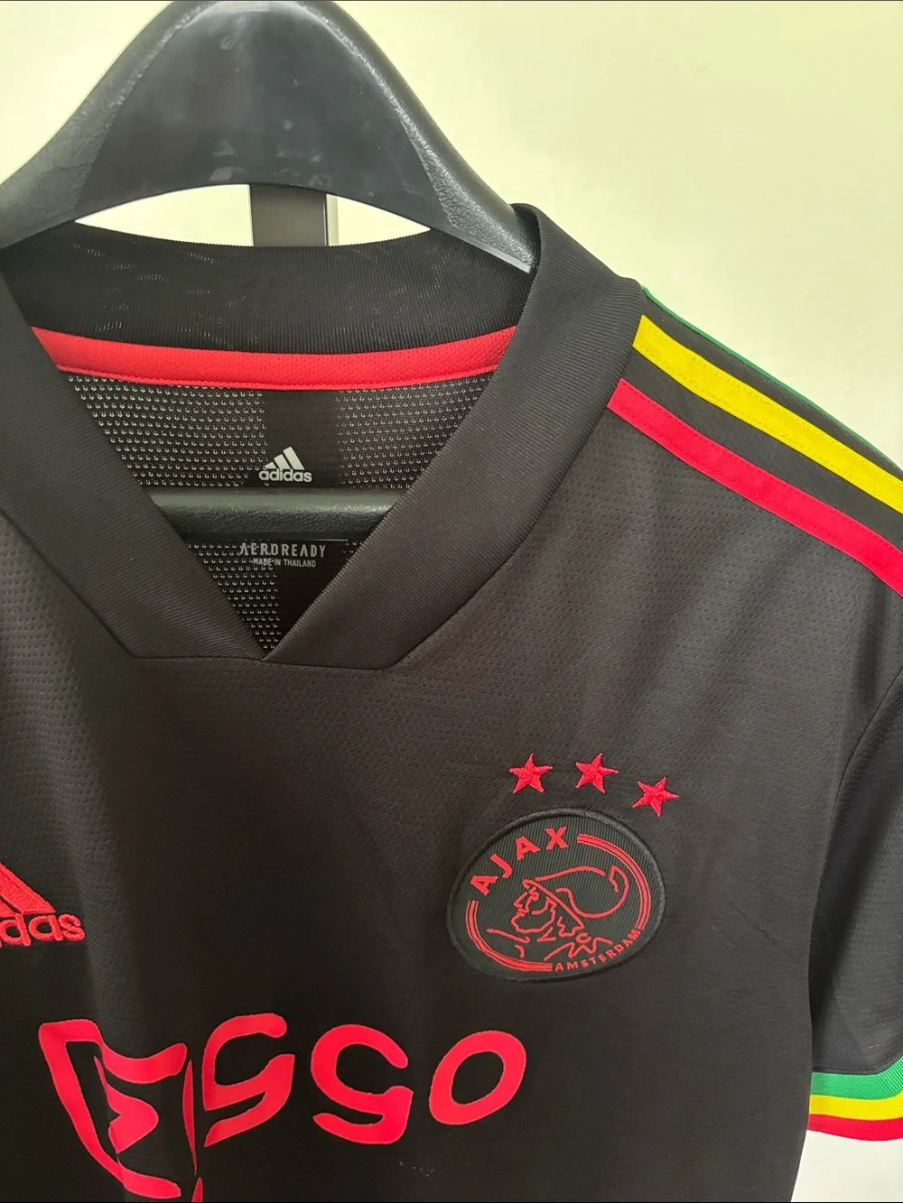 adidas Kids Black Ajax Jersey with Red Logos and Rasta Trim